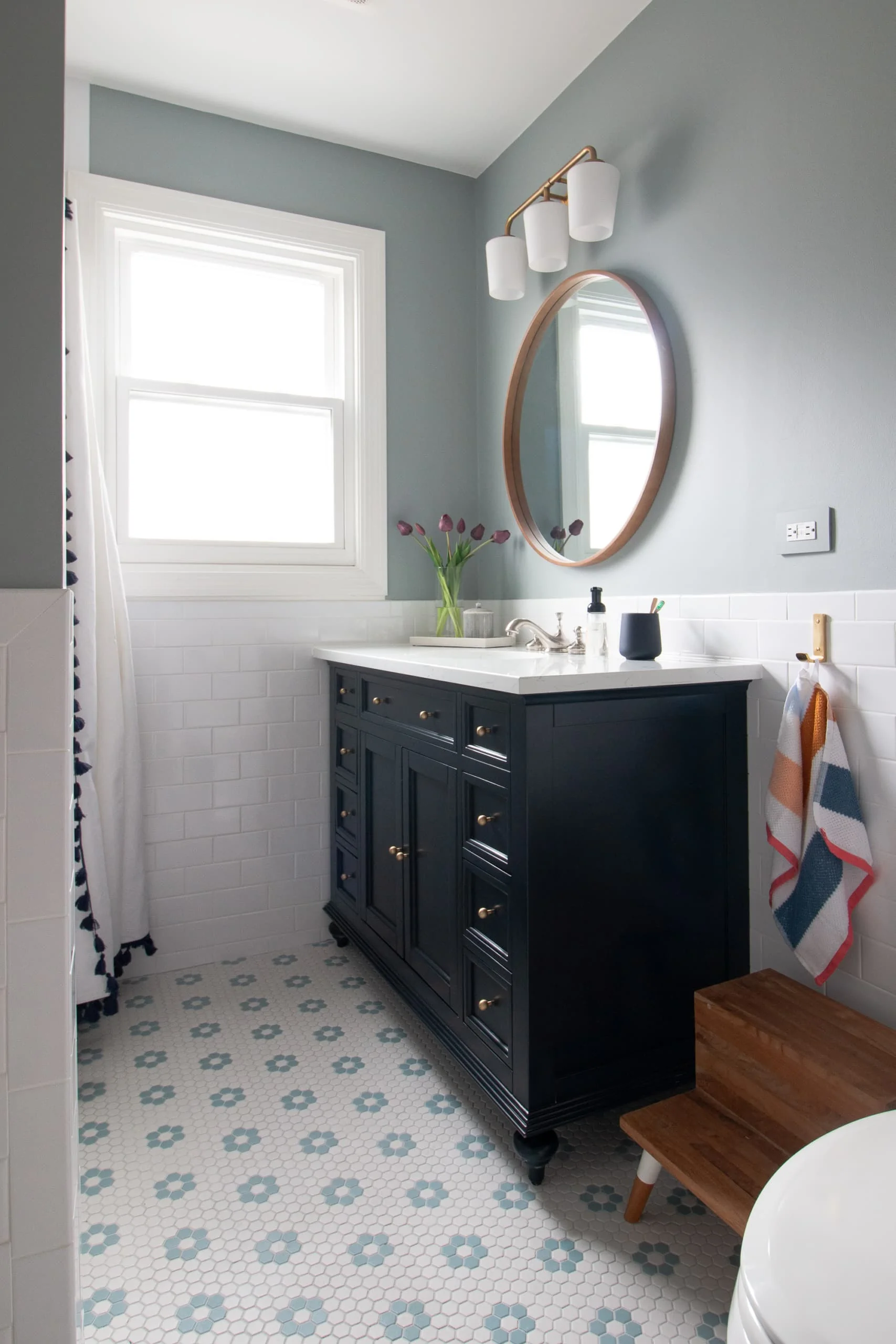 Our kids' bathroom is painted the color Boothbay Gray