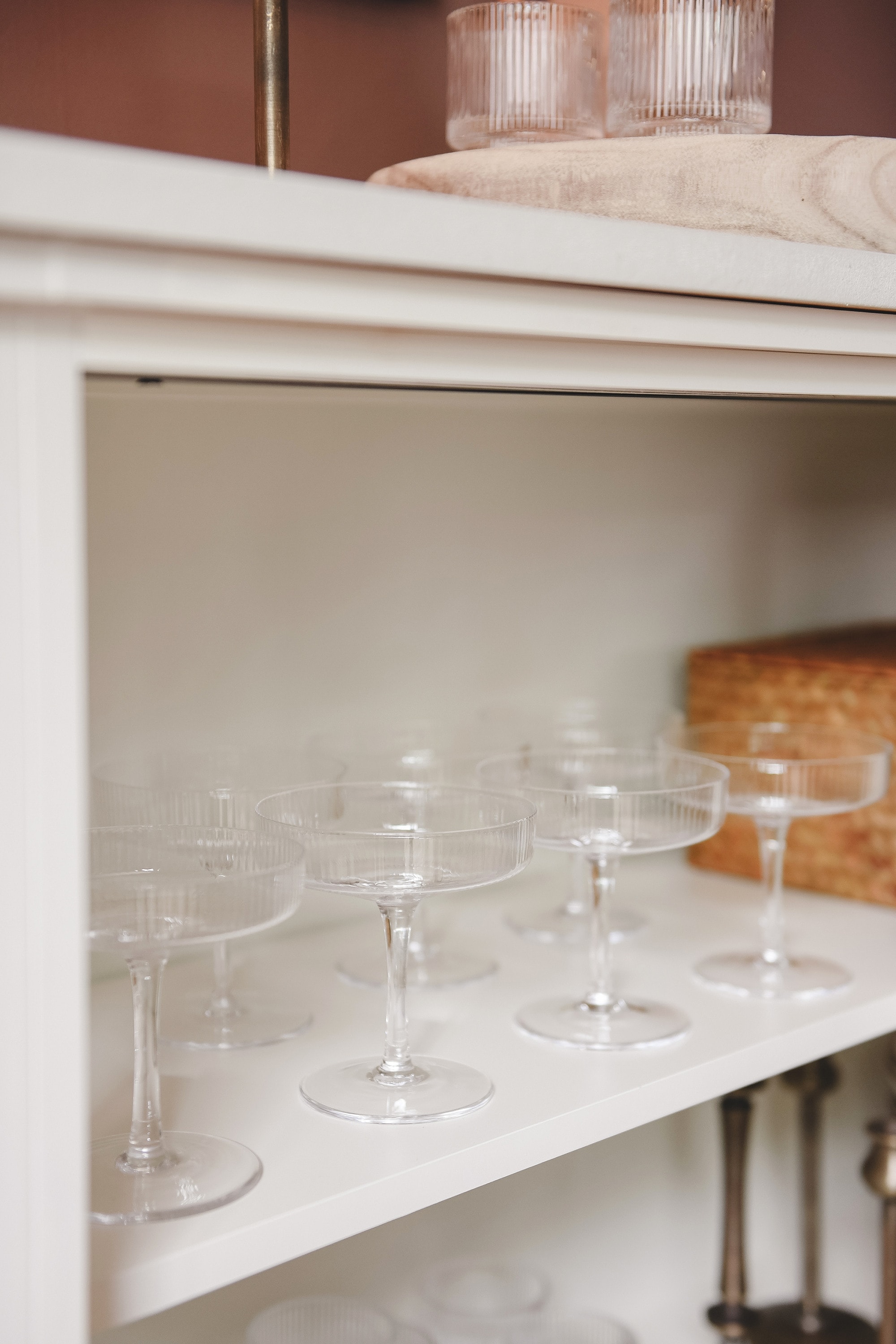 Glassware in a dining room sideboard