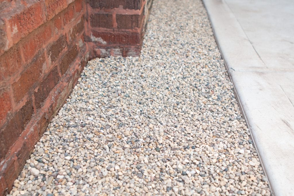 Our new side yard with pea gravel