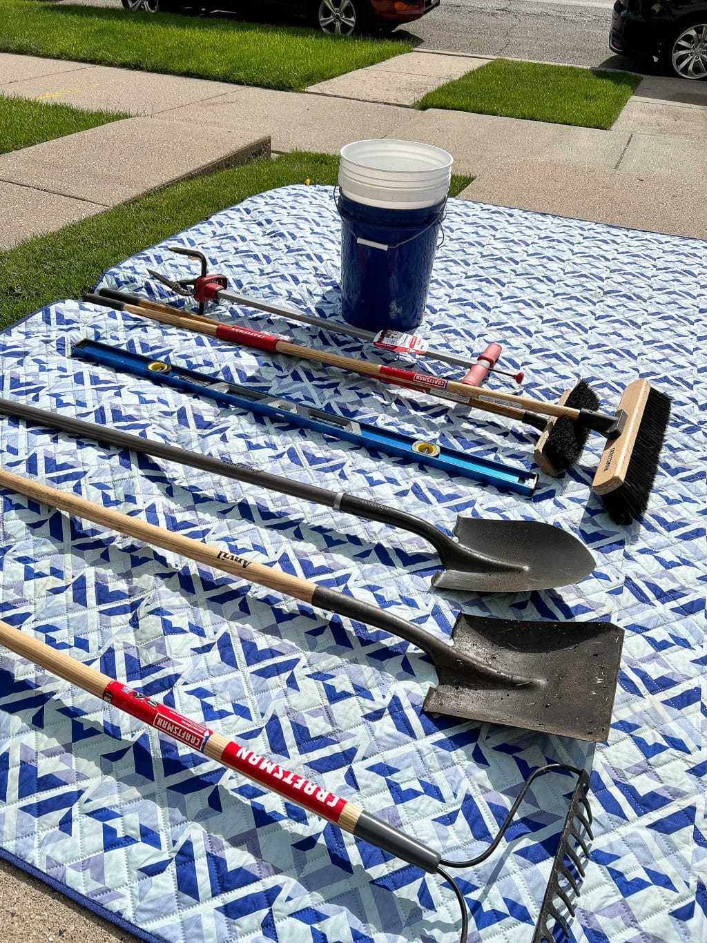 The tools we grabbed to create our pea gravel border