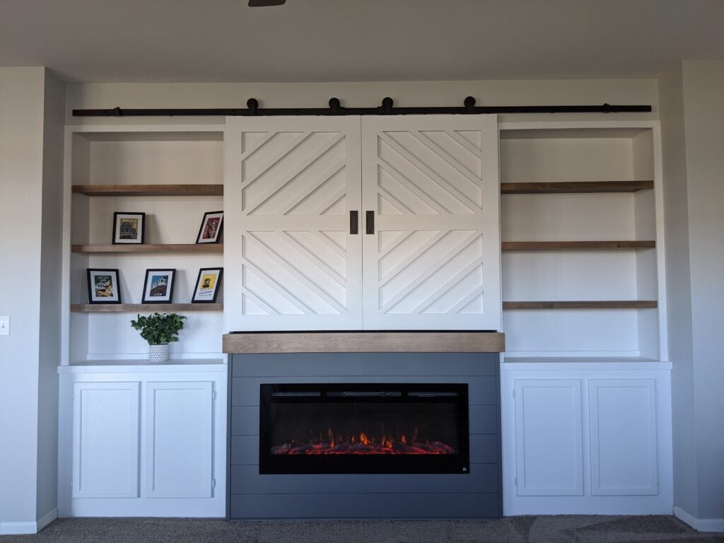 A fireplace with built-ins