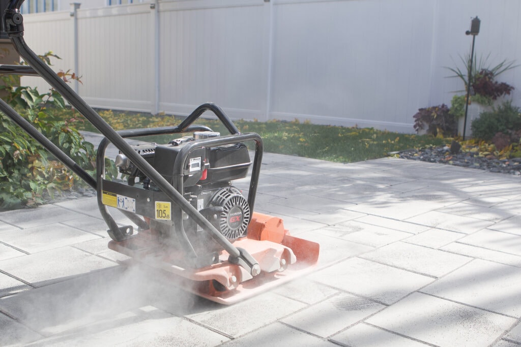 How to install polymeric sand with a vibratory plate compactor