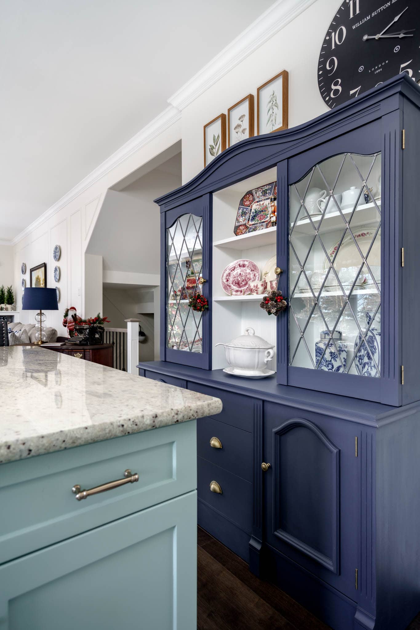 A blue hutch in the kitchen 