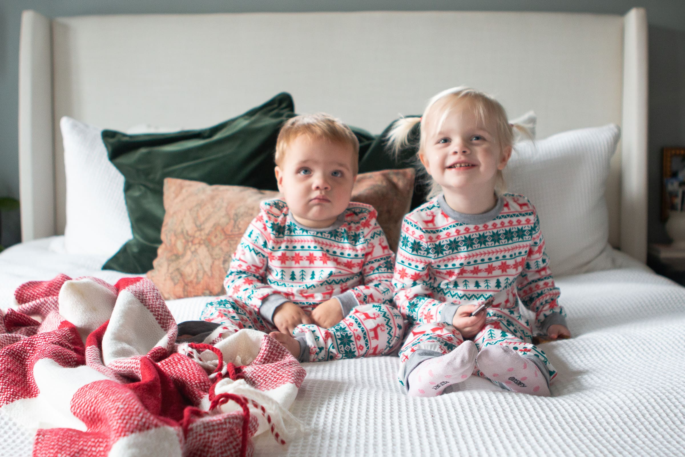Rory and Ellis wearing matching Christmas jammies