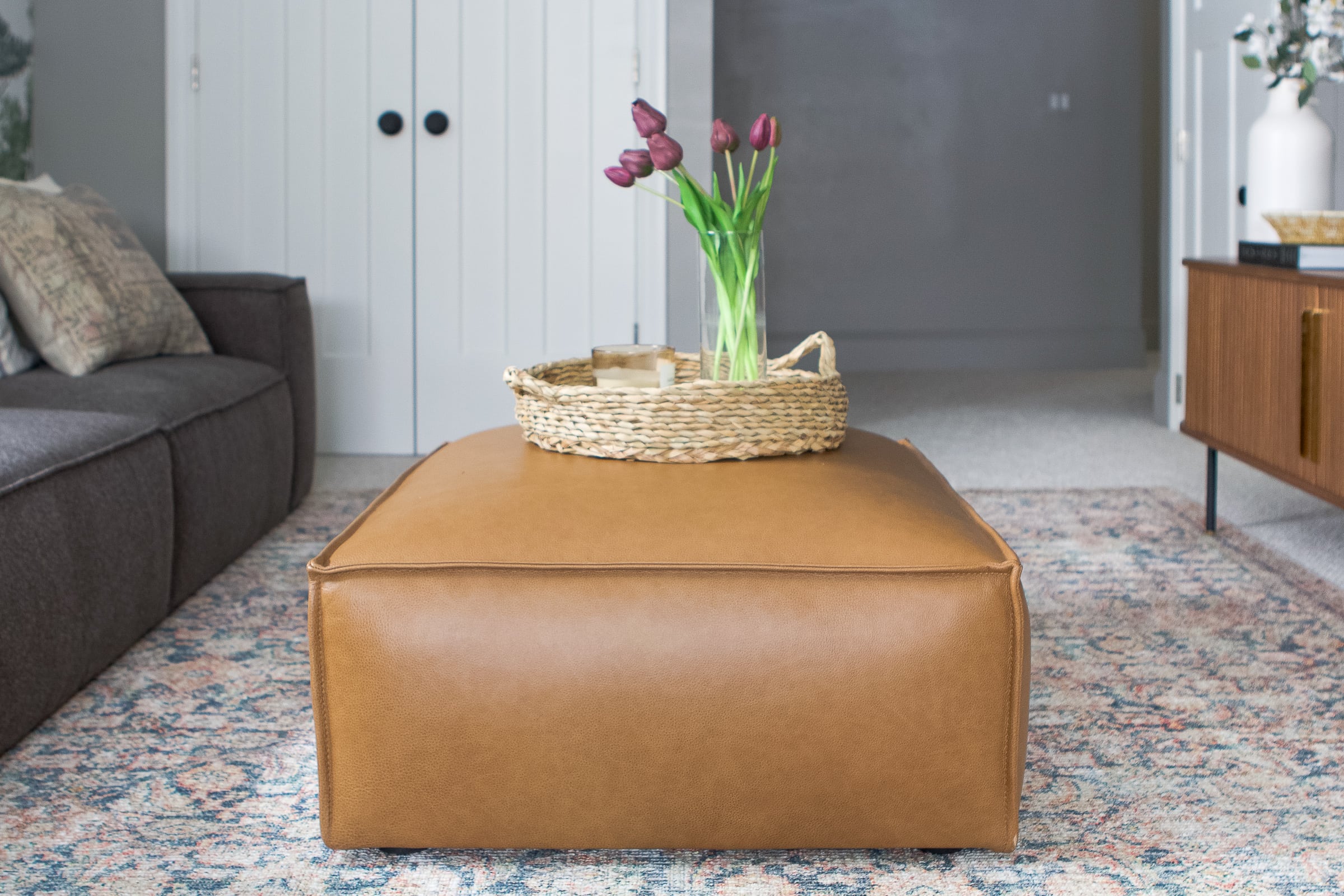 Our new leather ottoman from Castlery