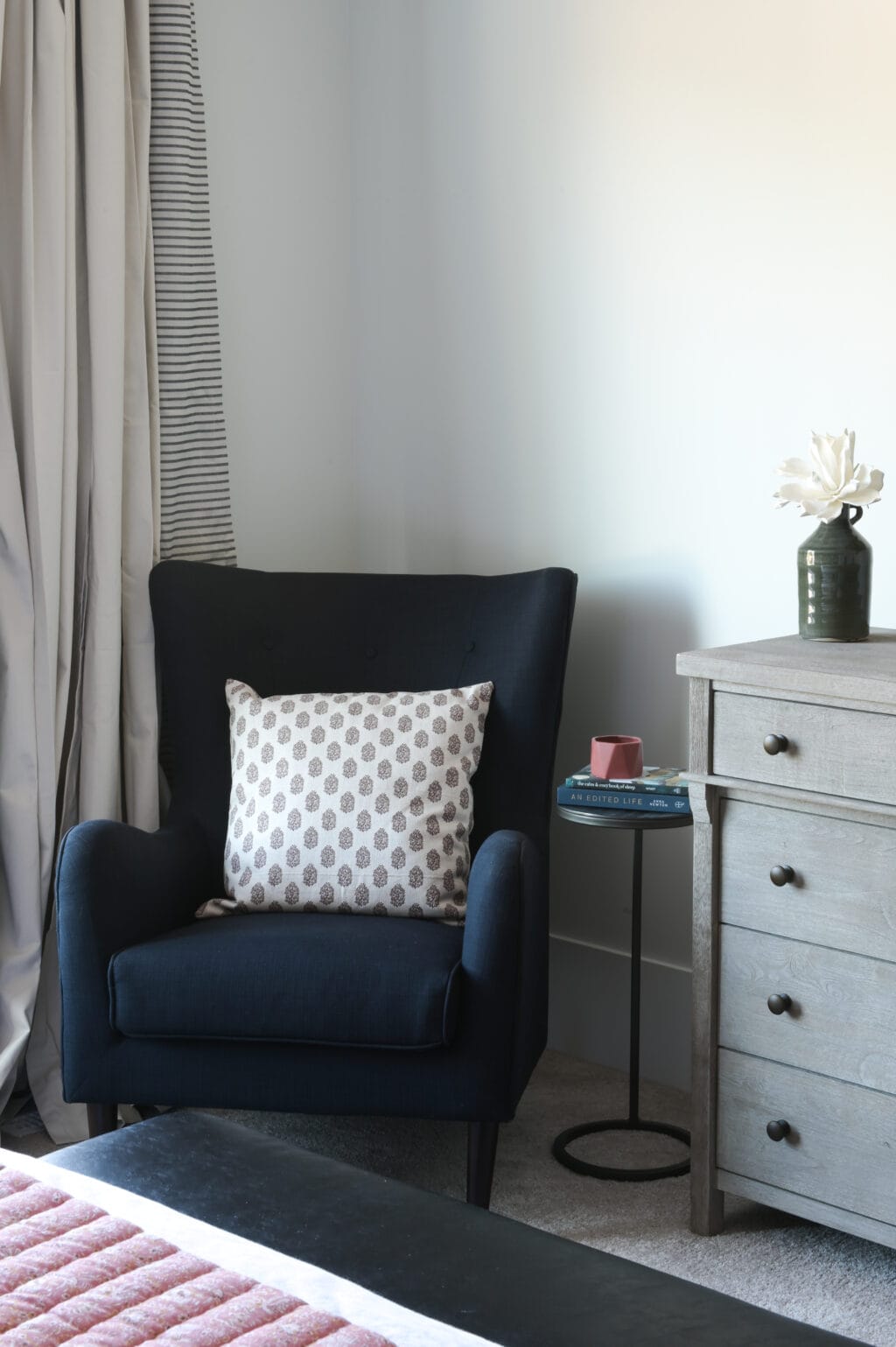 Adding a wingback chair to a bedroom