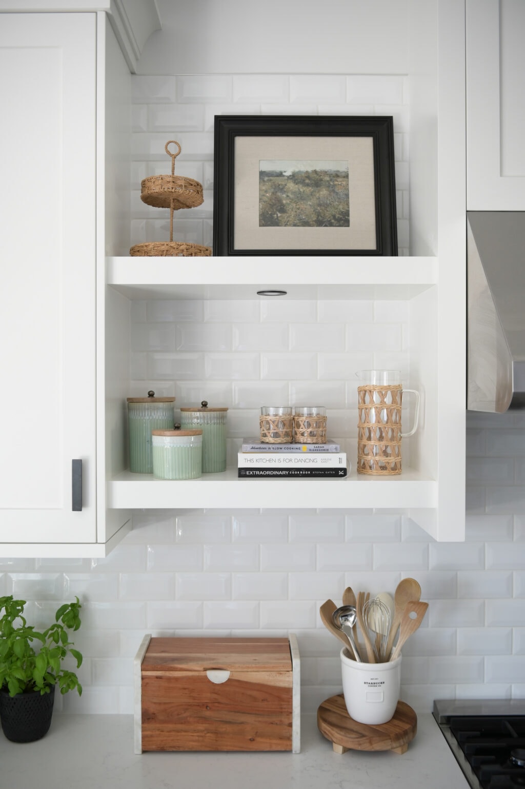 Adding open shelving to your kitchen near the hood