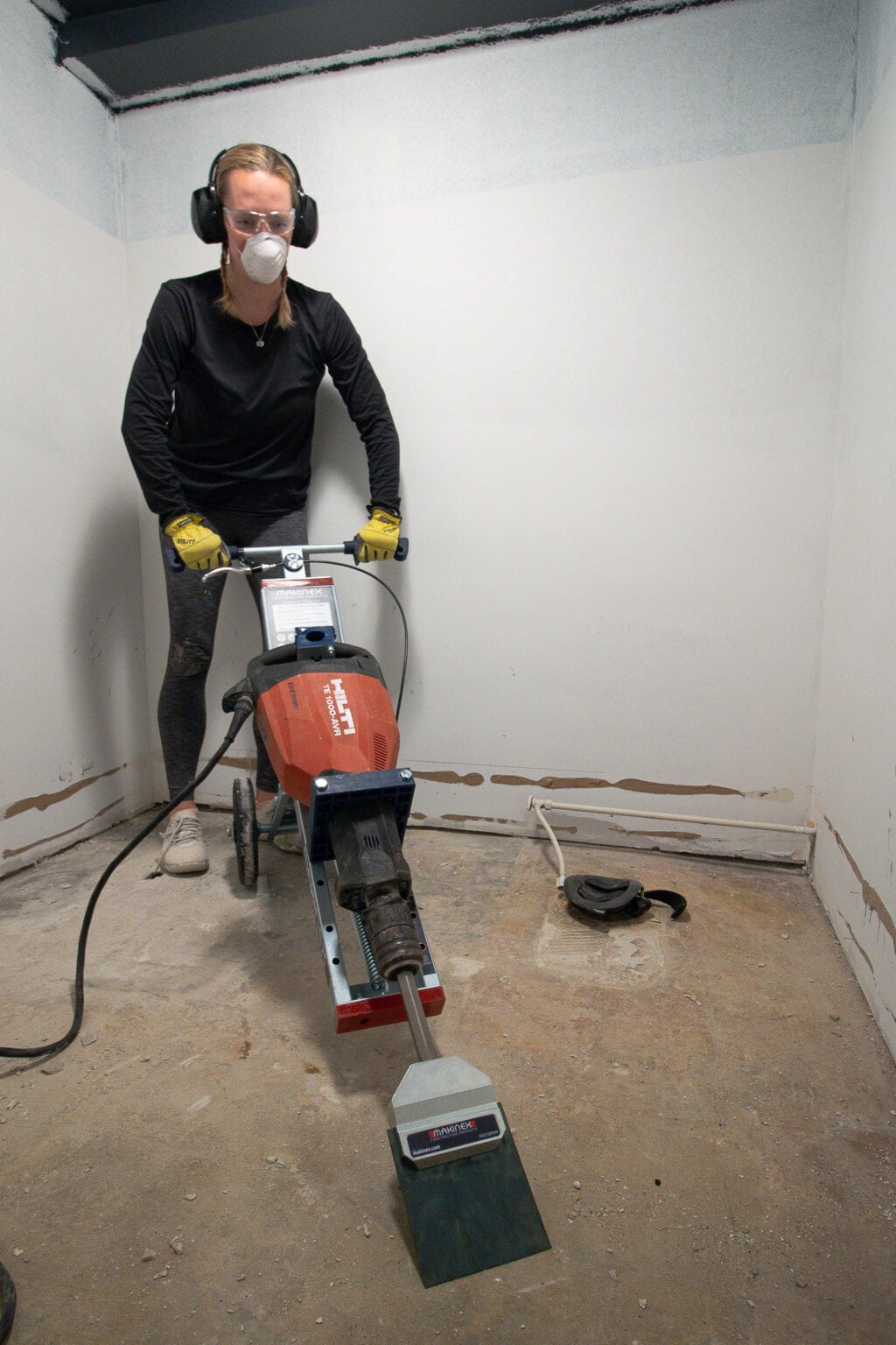 How to use a demo hammer to remove floor tile