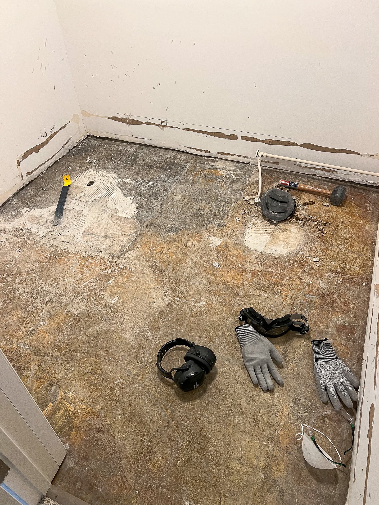 how to remove floor tile and demo a bathroom