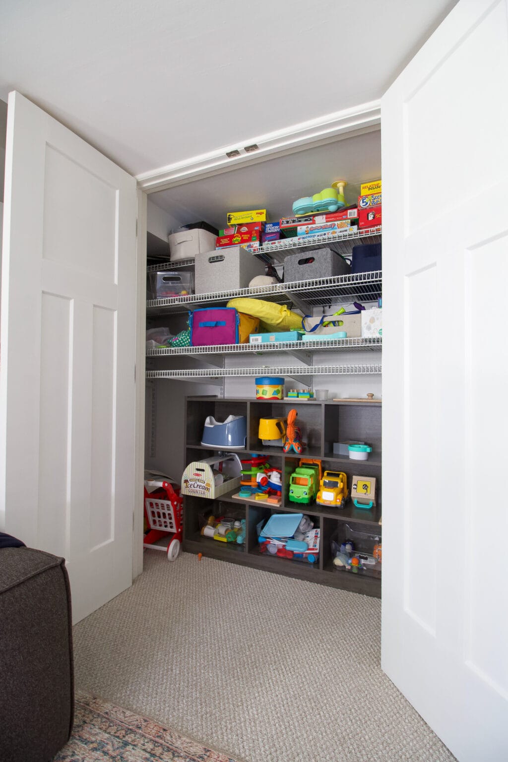 The playroom closet space needs some organization