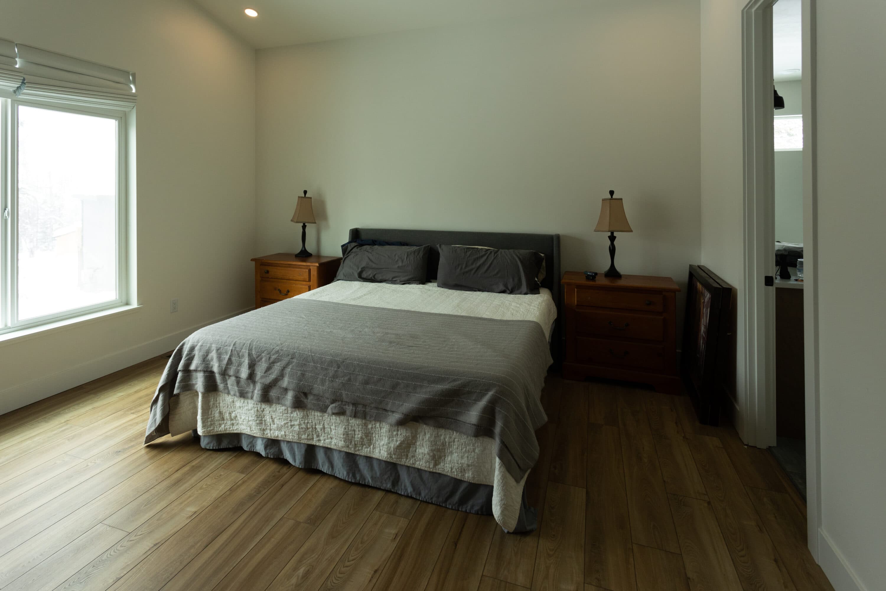 How do I make my blank bedroom feel cozier?