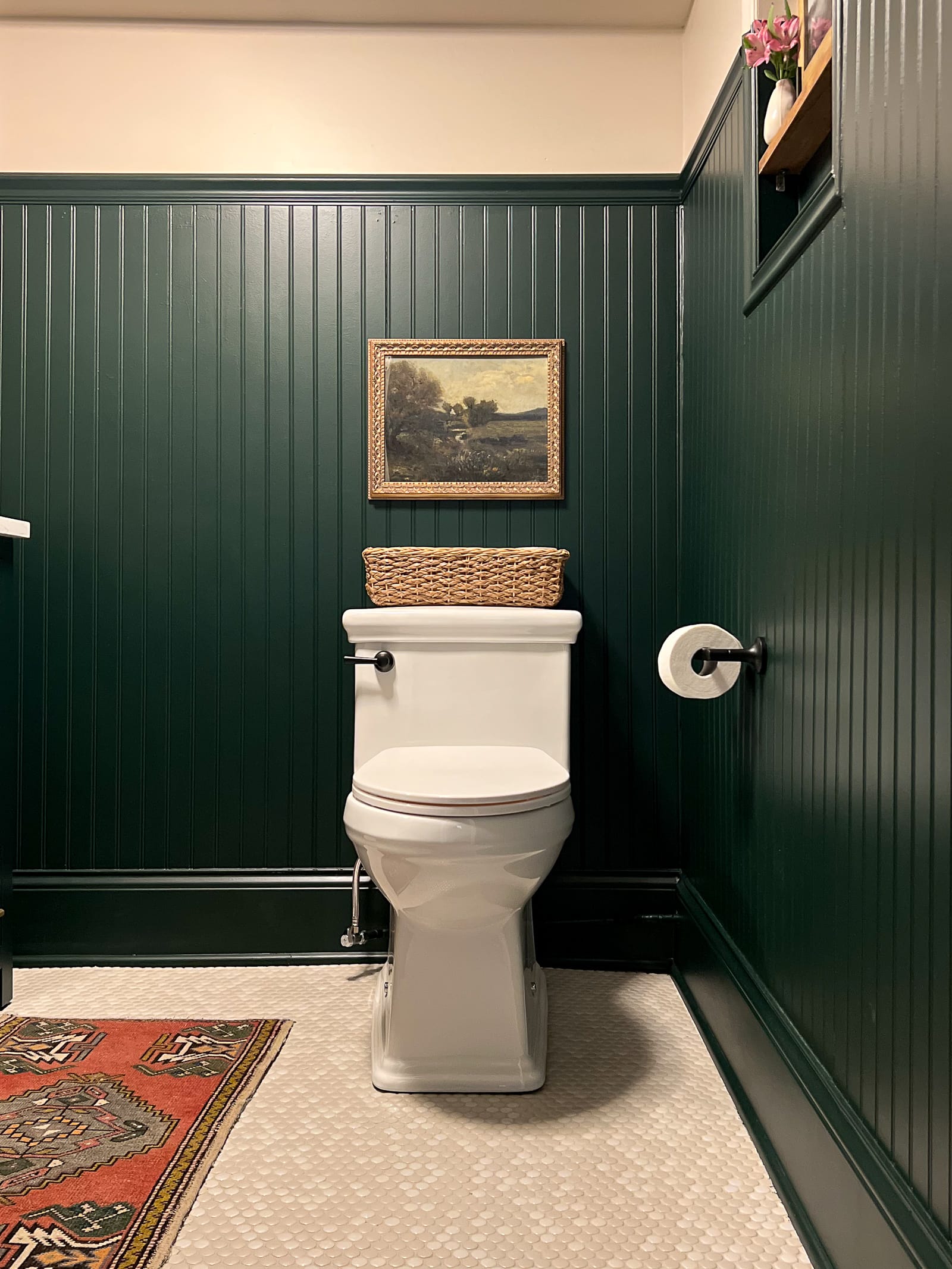 The reveal of our dark green bathroom in the basement