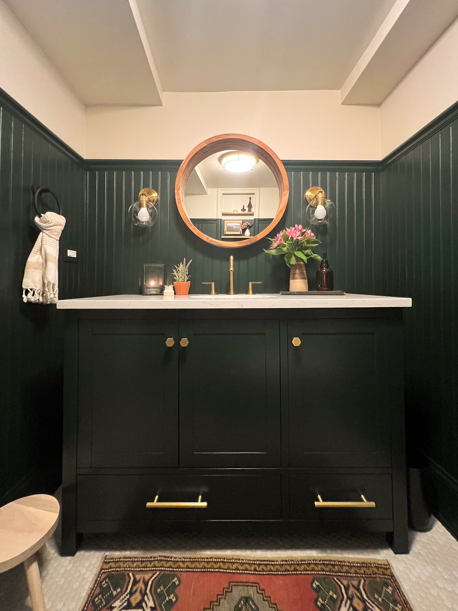 The reveal of our dark green bathroom