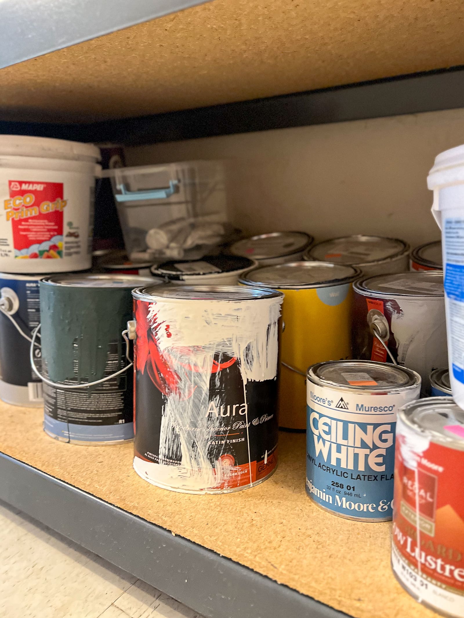 Paint cans in our storage room