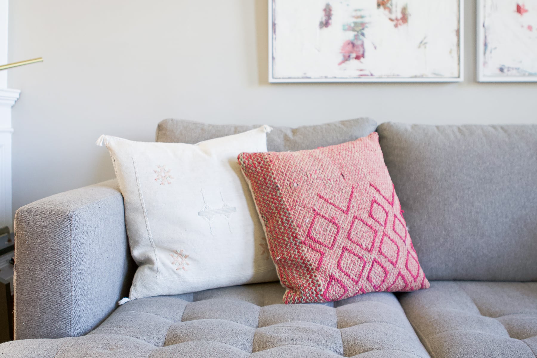Adding pink textiles to the couch