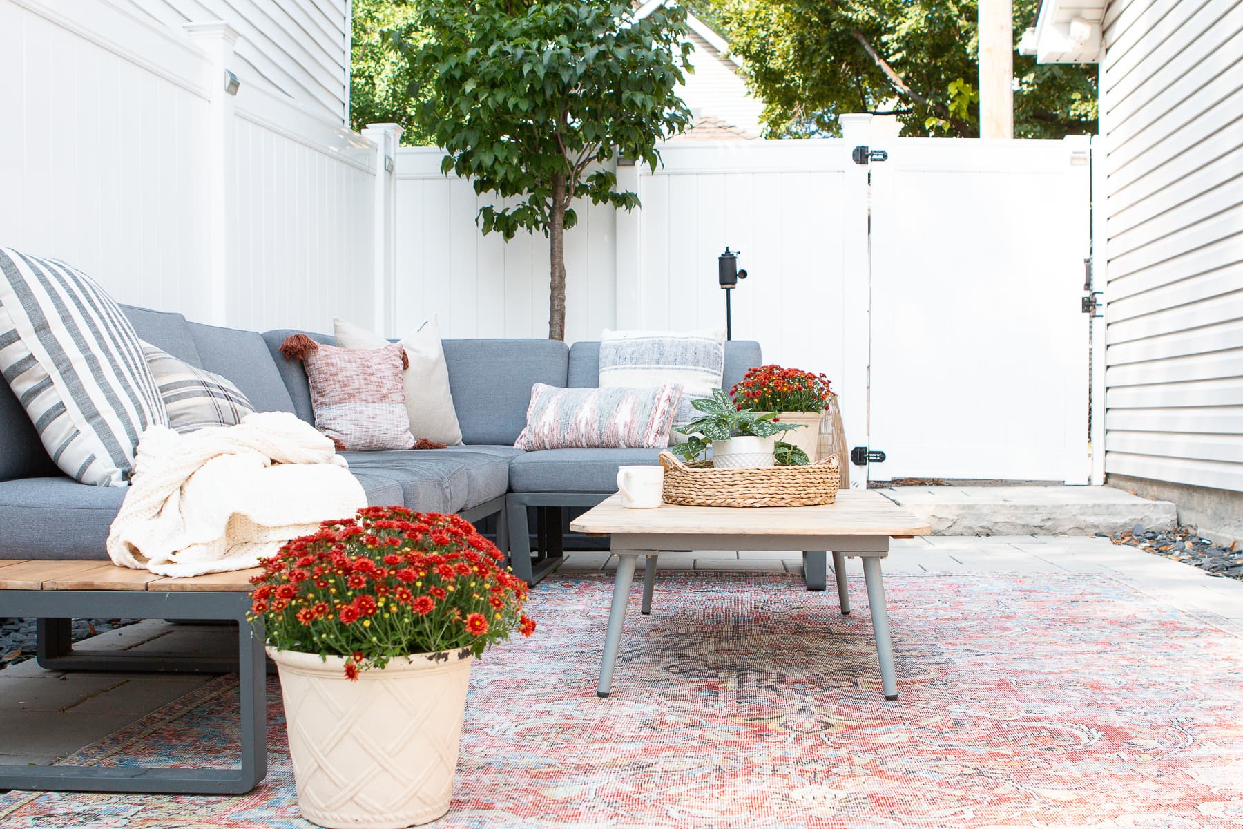 Adding some color to our backyard with an outdoor rug from Lowe's