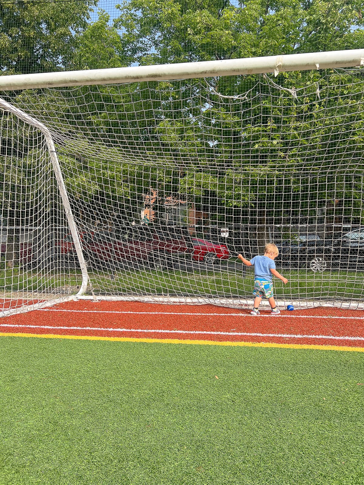 Ellis playing soccer during summer 2023