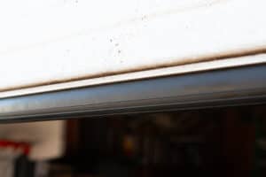 How To Install Garage Door Weatherstripping (DIY Guide)