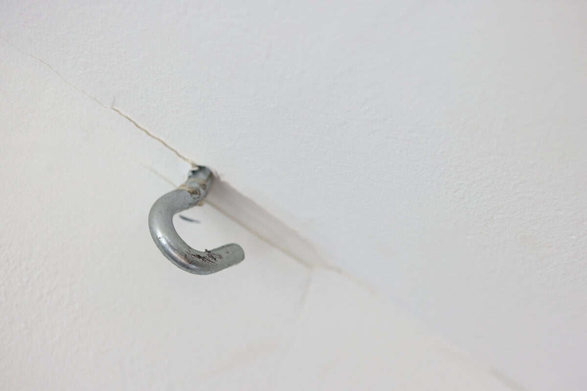 A ceiling hook in the joist