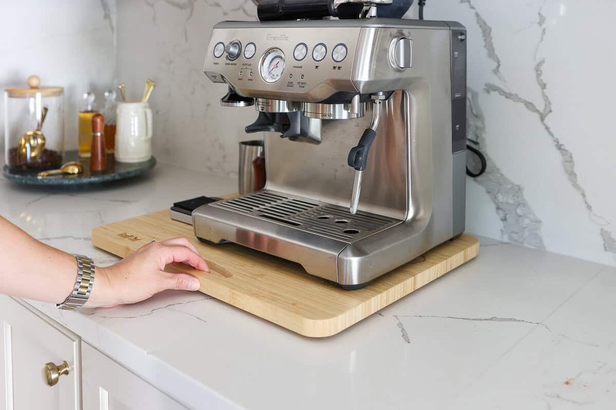 I put my espresso machine on a wood tray that rolls