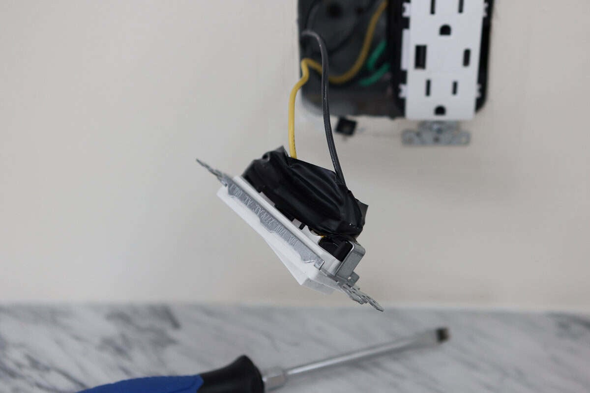 removing my old light switch to replace it with a dimmer switch