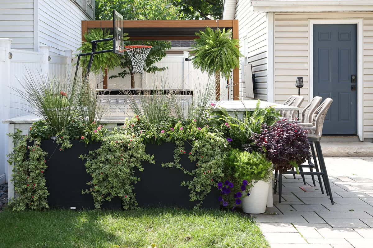 Our outdoor kitchen and side yard in our Chicago backyard